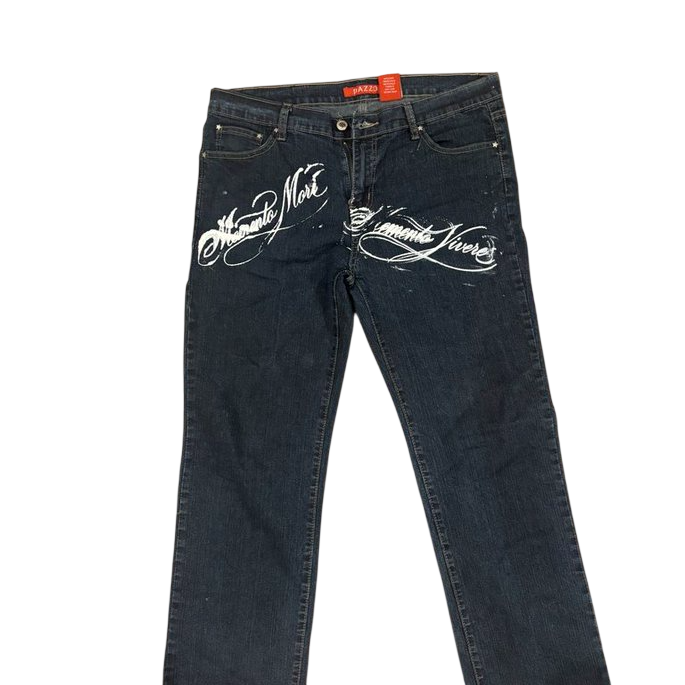 Dark denim with Memento Mori and Memento Vivere calligraphy across both front thighs